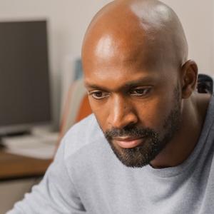 Black Man Wearing Gray Shirt