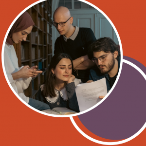 Individuals looking at paper