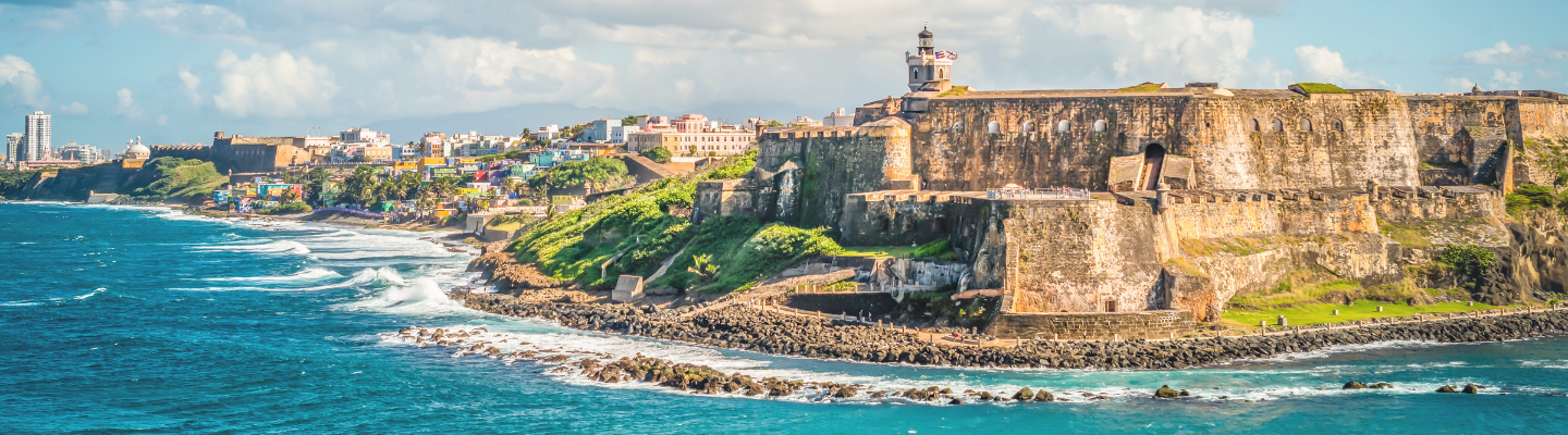 Puerto Rico Beach Scene with Historical Building in Background